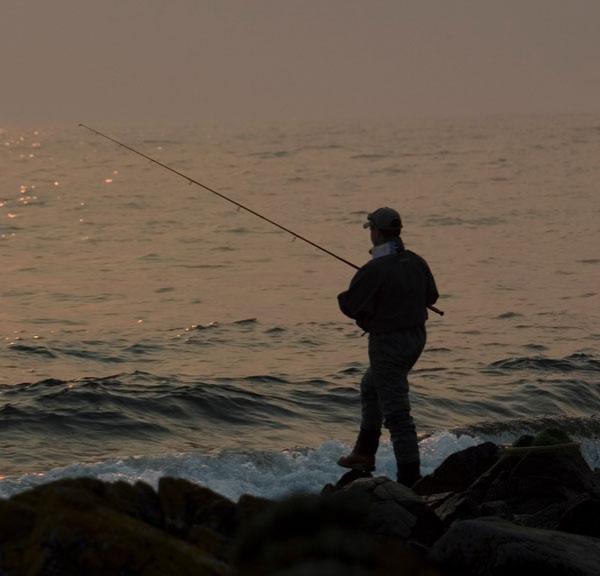 Fishing at sunset